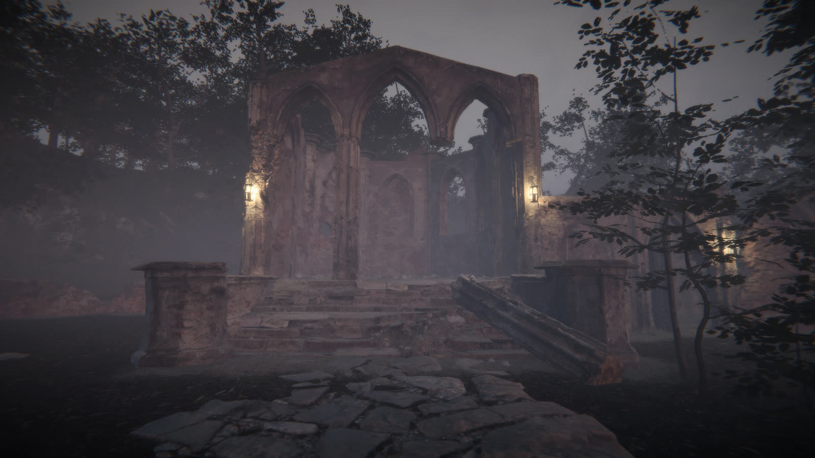 Ruins lit by lanterns at night