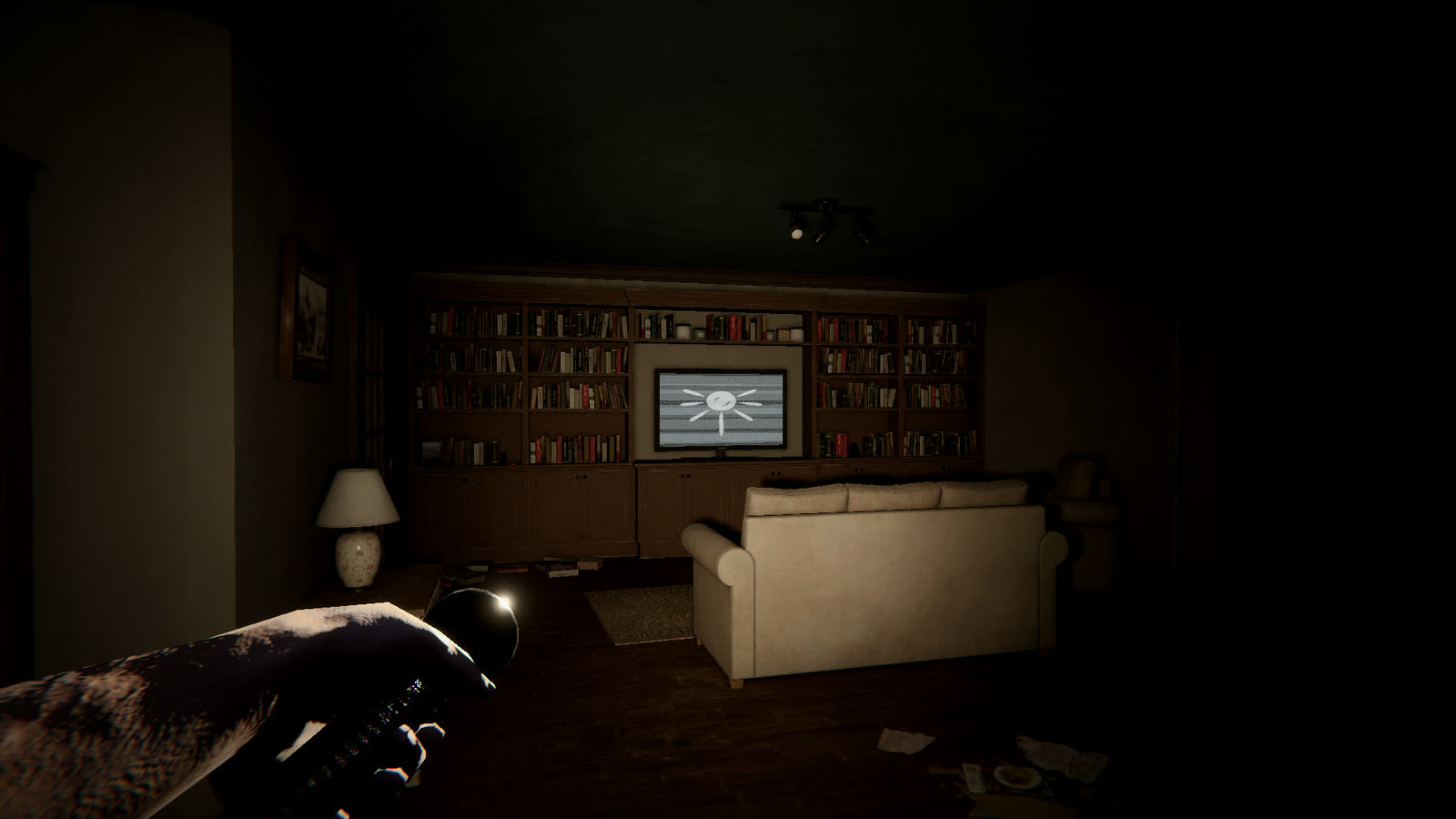 The cabin living room with the TV on